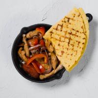 Куриный фахитос с тортильей и овощами